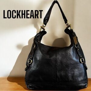 Lockheart Black Supple Leather rare and unique shoulder bag. Brass hardware Moto